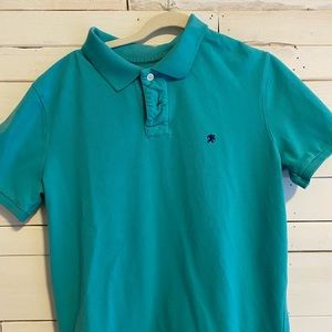 Aqua in color men’s polo